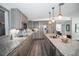 Bright kitchen with granite countertops, stainless steel appliances, and ample cabinet space at 3717 Downer Ave, Sarasota, FL 34240