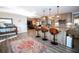 Kitchen with pendant lighting, a center island with bar stools, and an open floor plan at 3717 Downer Ave, Sarasota, FL 34240