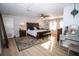 Spacious main bedroom with wooden furniture set and light hardwood floors at 3717 Downer Ave, Sarasota, FL 34240