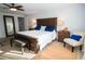 Comfortable main bedroom with hardwood floors and wooden furniture at 3717 Downer Ave, Sarasota, FL 34240