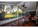 Inviting screened porch offering serene views of the surrounding landscape at 3717 Downer Ave, Sarasota, FL 34240