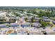 This aerial view highlights lush landscaping, a community pool, and well-maintained condo buildings at 3781 59Th W Ave # 3781, Bradenton, FL 34210