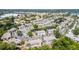 Aerial view shows several ponds, lush landscaping, and well-maintained condo buildings at 3781 59Th W Ave # 3781, Bradenton, FL 34210