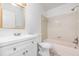 Bathroom featuring a vanity, toilet, mirror, and shower-tub combo at 3781 59Th W Ave # 3781, Bradenton, FL 34210
