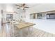 Inviting dining room adjacent to the open kitchen area with a clear view of the cozy living room at 3781 59Th W Ave # 3781, Bradenton, FL 34210