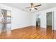 Spacious main bedroom featuring wood-look floors, ensuite bathroom, and walk-in closet at 3781 59Th W Ave # 3781, Bradenton, FL 34210
