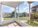 Relaxing screened patio with water view, lush landscaping and tiled floors at 3781 59Th W Ave # 3781, Bradenton, FL 34210