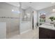 Modern bathroom featuring a stand-up shower and dual sink vanity at 3808 Eastham Ln, Bradenton, FL 34211
