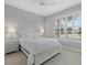 Bright bedroom with plantation shutters, plush carpet, and ample natural light at 3808 Eastham Ln, Bradenton, FL 34211