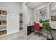 Bright office nook with granite counters, a built-in desk, and storage, offering a functional workspace at 3808 Eastham Ln, Bradenton, FL 34211