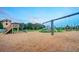 Community playground featuring swings, slides, and a wooden playhouse at 3808 Eastham Ln, Bradenton, FL 34211