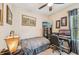 Bedroom with neutral decor, desk, and simple furnishings, ideal for a guest room or home office at 4016 Azurite Way, Bradenton, FL 34211