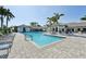 Beautiful community pool with many chairs for residents to relax and enjoy the Florida sun at 4016 Azurite Way, Bradenton, FL 34211