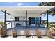 Charming front porch with comfortable seating, perfect for relaxing and enjoying the neighborhood view at 4111 E 13Th E St, Ellenton, FL 34222