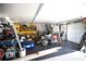 Spacious garage provides ample space for parking, storage, and workshop projects with a convenient roll up door at 4111 E 13Th E St, Ellenton, FL 34222