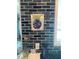 Close-up of the kitchen's eye-catching blue backsplash with unique mosaic art at 4111 E 13Th E St, Ellenton, FL 34222