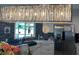 Modern kitchen boasts a stunning light fixture, stainless steel appliances, and blue subway tile backsplash at 4111 E 13Th E St, Ellenton, FL 34222