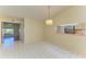 Bright dining area adjacent to kitchen with stainless steel appliances at 4313 Carol Ann Rd # 20, Sarasota, FL 34233