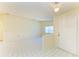 Bright and welcoming foyer with tile flooring, and an open layout to the living space at 4313 Carol Ann Rd # 20, Sarasota, FL 34233