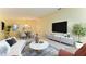 Open-concept living and dining area filled with natural light, perfect for entertaining guests at 4313 Carol Ann Rd # 20, Sarasota, FL 34233