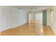 Spacious bedroom with wood floors, closet, and access to the bathroom at 4313 Carol Ann Rd # 20, Sarasota, FL 34233