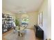 Dedicated home office with ample natural light, a modern desk, and minimalist decor at 4313 Carol Ann Rd # 20, Sarasota, FL 34233