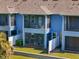 A view of a home's outdoor balconies with outdoor seating for relaxing at 4548 Chinkapin Dr, Sarasota, FL 34232