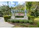 The community sign with attractive landscaping at 4548 Chinkapin Dr, Sarasota, FL 34232