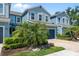 Attractive townhome with a two-car garage, beautiful landscaping and a brick driveway at 4548 Chinkapin Dr, Sarasota, FL 34232