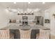 Open concept kitchen featuring a large island with bar seating at 4548 Chinkapin Dr, Sarasota, FL 34232