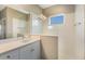 Modern bathroom features a spacious shower with subway tile and a sleek vanity with ample counter space at 4815 Deep Creek Ter, Parrish, FL 34219
