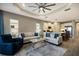 Open concept living area with comfortable seating, modern decor, and seamless transition to the kitchen at 4815 Deep Creek Ter, Parrish, FL 34219