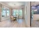 Inviting breakfast nook filled with natural light and views to backyard at 4815 W Sunset Blvd, Tampa, FL 33629