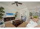 Bright living room with tile floors and neutral decor providing a comfortable and inviting space for relaxation at 4912 Sabal Lake Cir, Sarasota, FL 34238