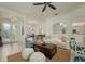Bright living room with tile floors, archways, and neutral decor providing an open and inviting space at 4912 Sabal Lake Cir, Sarasota, FL 34238