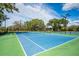 Well-maintained tennis courts offer a great way to stay active and enjoy the outdoors at 4912 Sabal Lake Cir, Sarasota, FL 34238