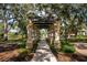 Shaded walkway with pergola leads to beautiful community amenities at 4912 Sabal Lake Cir, Sarasota, FL 34238