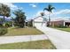 Charming single-story home featuring a well-manicured lawn and a spacious two-car garage at 5227 Aqua Breeze Dr, Bradenton, FL 34208