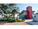 Modern building exterior with unique architectural details and a waterfront view at 532 Yale Rd, Venice, FL 34293