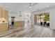 Spacious kitchen with a large island, modern appliances, and sliding doors to the patio at 532 Yale Rd, Venice, FL 34293