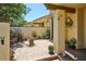 Inviting courtyard with brick pavers, potted plants, and charming details, perfect for outdoor relaxation and curb appeal at 5362 Huntingwood Ct # 16, Sarasota, FL 34235