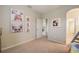 Bedroom featuring fun wall decor and view to the upstairs hallway at 6001 Anise Dr, Sarasota, FL 34238