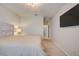 Comfortable bedroom featuring a bed and carpeted floors at 6001 Anise Dr, Sarasota, FL 34238