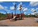 Community playground featuring a pirate ship play structure with slides, climbing features, and nautical details at 6001 Anise Dr, Sarasota, FL 34238