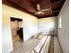 Bedroom showcasing wood ceilings, a ceiling fan, and natural light, creating a comfortable ambiance at 612 Shore Rd, Nokomis, FL 34275