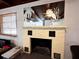 Close-up of decorative fireplace with unique design and natural lighting at 612 Shore Rd, Nokomis, FL 34275