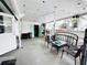 Covered patio with a lounge area and plenty of storage space at 612 Shore Rd, Nokomis, FL 34275