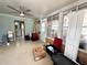 Versatile sunroom showcasing an open layout, natural light, and convenient access to the backyard at 612 Shore Rd, Nokomis, FL 34275