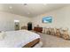 Spacious bedroom offers plenty of room and natural light with an array of windows at 7420 Tuttle Ave, Sarasota, FL 34243