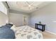 Bedroom featuring carpet flooring, a ceiling fan, and neutral paint at 7420 Tuttle Ave, Sarasota, FL 34243